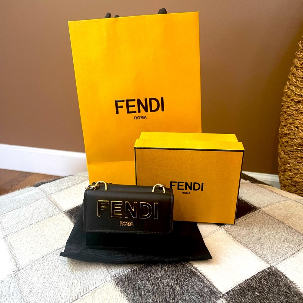 Authentic Fendi Black Leather Micro Trifold with Chain. Excellent condition!